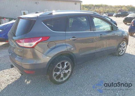 2014 Ford Escape Titanium z USA, uszkodzony, nr VIN 1FMCU9J90EUA00577